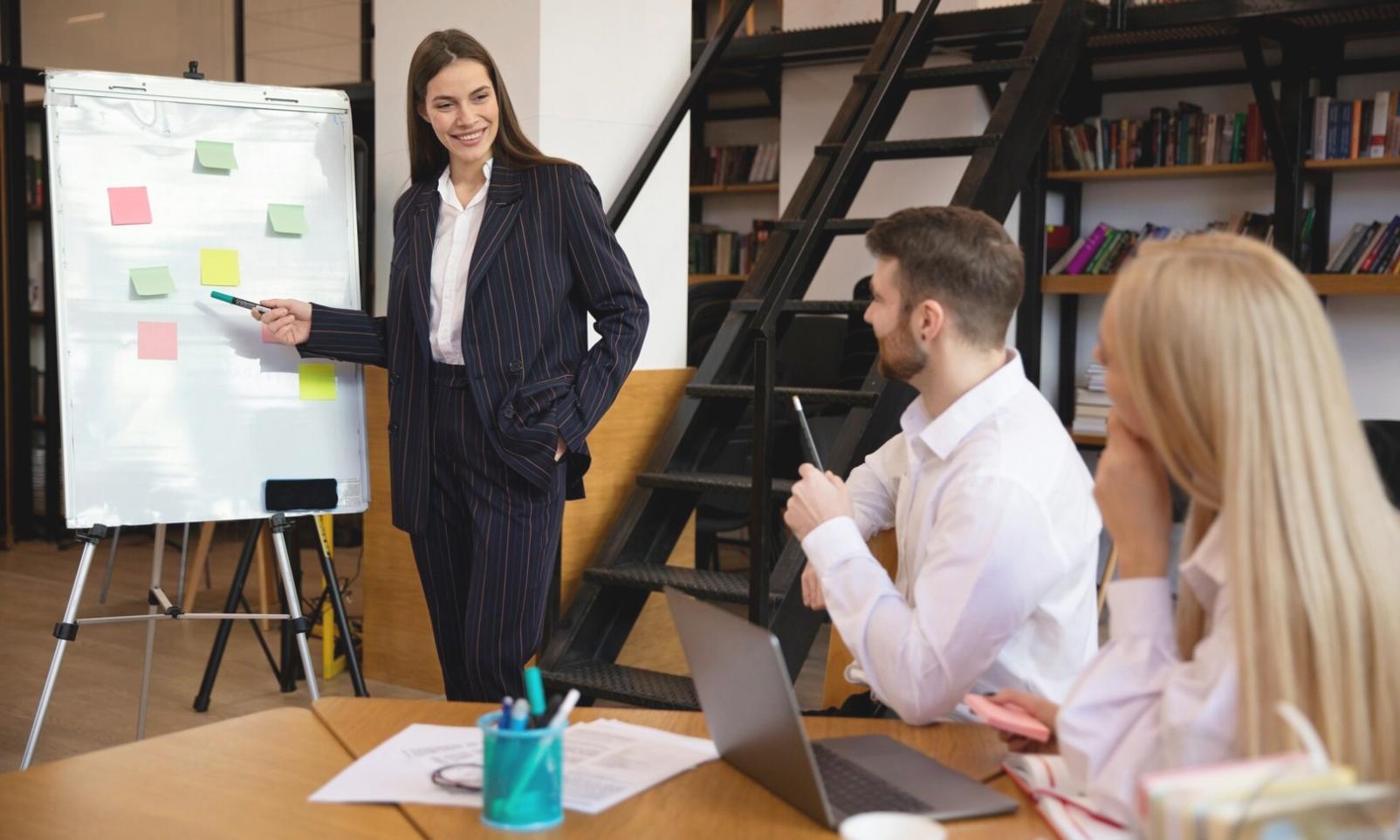 Professional finance team analyzing data and financial reports in modern office environment